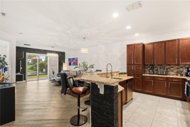 This is a Unique town house in one of the most desirables on Eagle Creek Golf Club in Florida - for sale on GolfHomes.com, golf home, golf lot