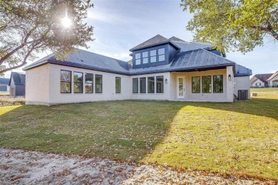 Completed in 2024, this 5 bedroom, 2 level waterfront home is on Sugar Tree Golf and Country Club in Texas - for sale on GolfHomes.com, golf home, golf lot