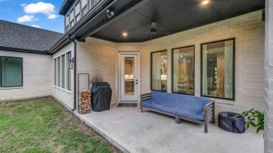 Completed in 2024, this 5 bedroom, 2 level waterfront home is on Sugar Tree Golf and Country Club in Texas - for sale on GolfHomes.com, golf home, golf lot