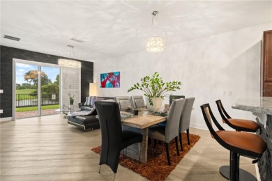 This is a Unique town house in one of the most desirables on Eagle Creek Golf Club in Florida - for sale on GolfHomes.com, golf home, golf lot