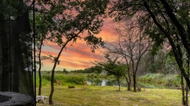 Completed in 2024, this 5 bedroom, 2 level waterfront home is on Sugar Tree Golf and Country Club in Texas - for sale on GolfHomes.com, golf home, golf lot