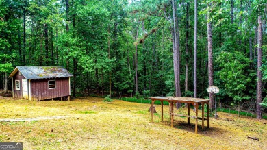 Welcome to your dream home in the sought-after Turtle Cove on Turtle Cove Golf Course in Georgia - for sale on GolfHomes.com, golf home, golf lot