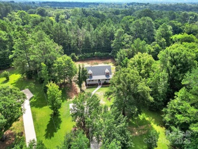 Welcome to this stunning 3-bedroom, 2-bathroom home nestled on on Rock Hill Country Club in South Carolina - for sale on GolfHomes.com, golf home, golf lot