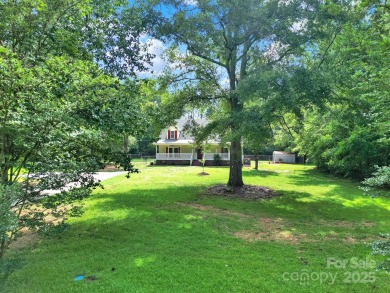 Welcome to this stunning 3-bedroom, 2-bathroom home nestled on on Rock Hill Country Club in South Carolina - for sale on GolfHomes.com, golf home, golf lot