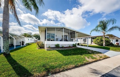 Located in the highly desirable STONEHEDGE ON THE HILL 55+ on Tarpon Springs Golf Course in Florida - for sale on GolfHomes.com, golf home, golf lot