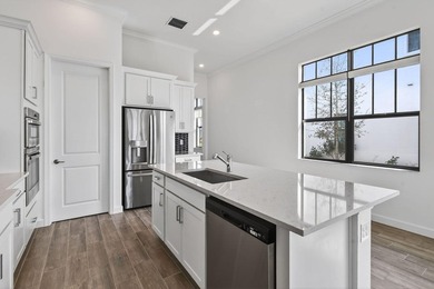 Nestled within a prestigious gated golf community, this on The Tesoro Golf Course and Club in Florida - for sale on GolfHomes.com, golf home, golf lot