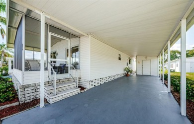 Located in the highly desirable STONEHEDGE ON THE HILL 55+ on Tarpon Springs Golf Course in Florida - for sale on GolfHomes.com, golf home, golf lot