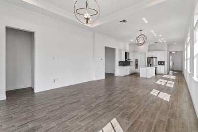 Nestled within a prestigious gated golf community, this on The Tesoro Golf Course and Club in Florida - for sale on GolfHomes.com, golf home, golf lot