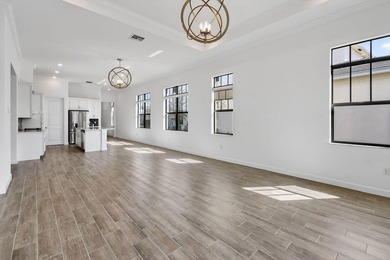 Nestled within a prestigious gated golf community, this on The Tesoro Golf Course and Club in Florida - for sale on GolfHomes.com, golf home, golf lot