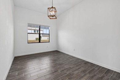 Nestled within a prestigious gated golf community, this on The Tesoro Golf Course and Club in Florida - for sale on GolfHomes.com, golf home, golf lot