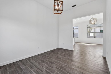 Nestled within a prestigious gated golf community, this on The Tesoro Golf Course and Club in Florida - for sale on GolfHomes.com, golf home, golf lot