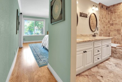 Enjoy peaceful lakeside living in this beautifully updated condo on Villages Golf and Country Club in California - for sale on GolfHomes.com, golf home, golf lot