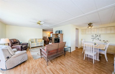 Located in the highly desirable STONEHEDGE ON THE HILL 55+ on Tarpon Springs Golf Course in Florida - for sale on GolfHomes.com, golf home, golf lot