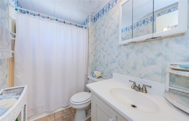 Located in the highly desirable STONEHEDGE ON THE HILL 55+ on Tarpon Springs Golf Course in Florida - for sale on GolfHomes.com, golf home, golf lot