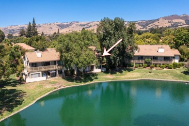 Enjoy peaceful lakeside living in this beautifully updated condo on Villages Golf and Country Club in California - for sale on GolfHomes.com, golf home, golf lot