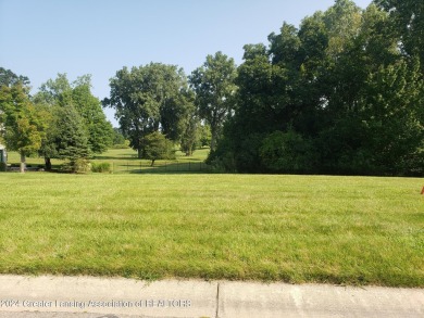 This beautiful lot located in the Greens at Walnut Hills on Walnut Hills Country Club in Michigan - for sale on GolfHomes.com, golf home, golf lot