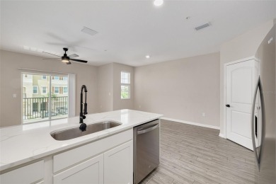 This tastefully done resort style townhome in a gated community on Gulf Harbors Golf Course in Florida - for sale on GolfHomes.com, golf home, golf lot