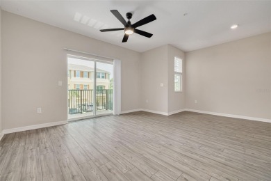 This tastefully done resort style townhome in a gated community on Gulf Harbors Golf Course in Florida - for sale on GolfHomes.com, golf home, golf lot