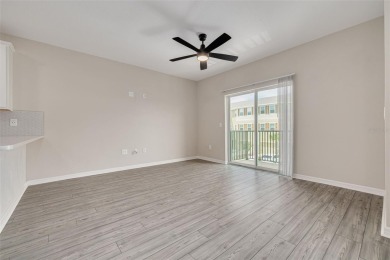 This tastefully done resort style townhome in a gated community on Gulf Harbors Golf Course in Florida - for sale on GolfHomes.com, golf home, golf lot