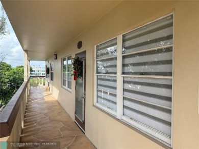 This elegant 2-bedroom 2-bathroom condo features a SPACIOUS on Hillsboro Pines Golf in Florida - for sale on GolfHomes.com, golf home, golf lot