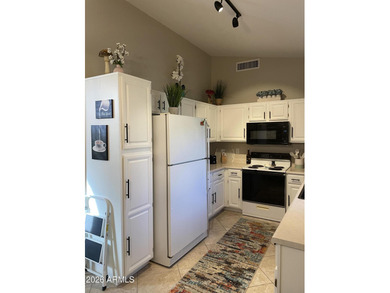 Beautiful 2-bedroom, 2-bath Corner Casita located in Sun Village on Sun Village Golf Course in Arizona - for sale on GolfHomes.com, golf home, golf lot