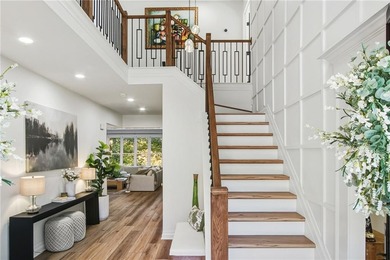 Experience the ultimate in refined living with this stunning 4 on Towne Lake Hills Golf Club in Georgia - for sale on GolfHomes.com, golf home, golf lot