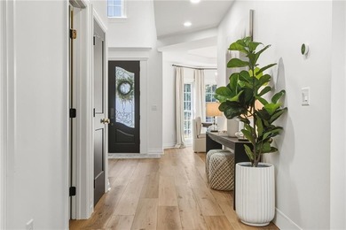 Experience the ultimate in refined living with this stunning 4 on Towne Lake Hills Golf Club in Georgia - for sale on GolfHomes.com, golf home, golf lot