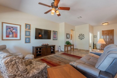 Sitting on a corner lot, this SEDONA model is in the 55+ adult on Lone Tree Golf Club in Arizona - for sale on GolfHomes.com, golf home, golf lot