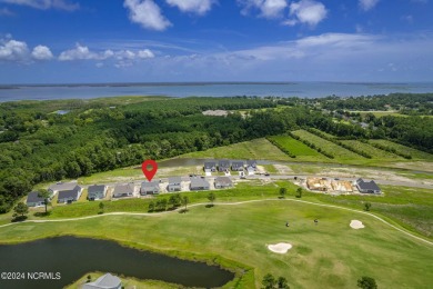 Walking into 211 Windswept Lane is like taking a deep breath and on North River Club in North Carolina - for sale on GolfHomes.com, golf home, golf lot