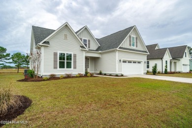 Walking into 211 Windswept Lane is like taking a deep breath and on North River Club in North Carolina - for sale on GolfHomes.com, golf home, golf lot