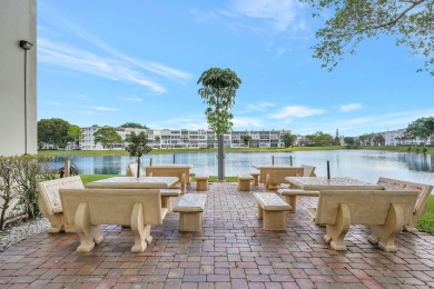 High end remodel, fully furnished, move in ready. expanded open on Hillsboro Pines Golf in Florida - for sale on GolfHomes.com, golf home, golf lot