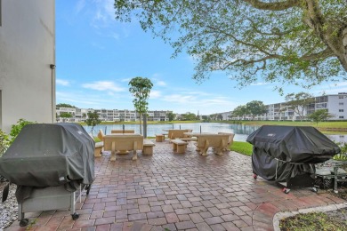 High end remodel, fully furnished, move in ready. expanded open on Hillsboro Pines Golf in Florida - for sale on GolfHomes.com, golf home, golf lot