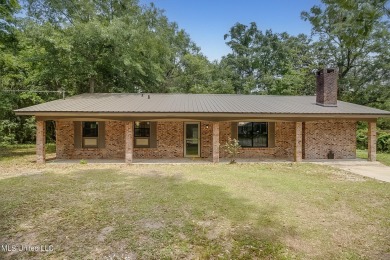Nestled in the tranquil community of North Gautier, this on Mississippi National Golf Course in Mississippi - for sale on GolfHomes.com, golf home, golf lot
