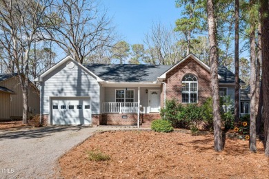 Beautiful 3 Bed/2 Bath one story home nestled in the woods of a on Carolina Trace Country Club in North Carolina - for sale on GolfHomes.com, golf home, golf lot