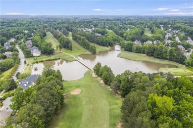 Southern-Inspired Cape Cod Estate on the 15th Hole in Gated on Alpharetta Athletic Club East in Georgia - for sale on GolfHomes.com, golf home, golf lot
