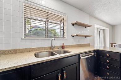 Welcome to this spacious yet cozy, 3 Bedroom, 2 Bath, end unit on Seasons Ridge At Four Seasons in Missouri - for sale on GolfHomes.com, golf home, golf lot