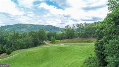 There are amazing views of layered mountains to the east and on Waterfall Country Club in Georgia - for sale on GolfHomes.com, golf home, golf lot