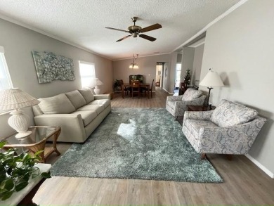 Welcome your guests to a private and serene space, situated on on Del Tura Golf and Country Club in Florida - for sale on GolfHomes.com, golf home, golf lot