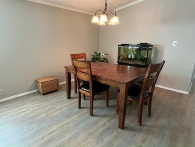 Welcome your guests to a private and serene space, situated on on Del Tura Golf and Country Club in Florida - for sale on GolfHomes.com, golf home, golf lot