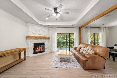 Welcome to this spacious yet cozy, 3 Bedroom, 2 Bath, end unit on Seasons Ridge At Four Seasons in Missouri - for sale on GolfHomes.com, golf home, golf lot
