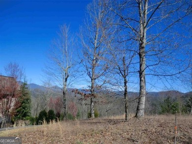 There are amazing views of layered mountains to the east and on Waterfall Country Club in Georgia - for sale on GolfHomes.com, golf home, golf lot