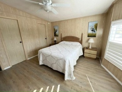 Welcome your guests to a private and serene space, situated on on Del Tura Golf and Country Club in Florida - for sale on GolfHomes.com, golf home, golf lot
