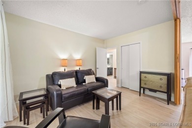 Welcome to this spacious yet cozy, 3 Bedroom, 2 Bath, end unit on Seasons Ridge At Four Seasons in Missouri - for sale on GolfHomes.com, golf home, golf lot