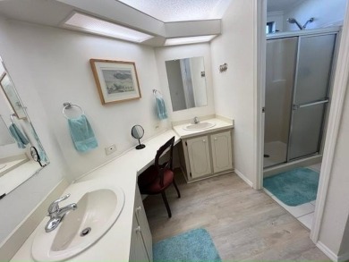 Welcome your guests to a private and serene space, situated on on Del Tura Golf and Country Club in Florida - for sale on GolfHomes.com, golf home, golf lot