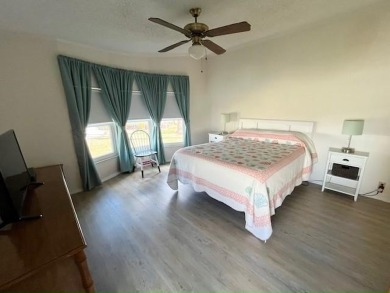 Welcome your guests to a private and serene space, situated on on Del Tura Golf and Country Club in Florida - for sale on GolfHomes.com, golf home, golf lot