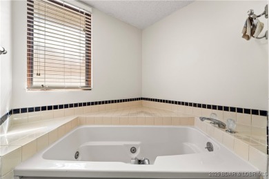 Welcome to this spacious yet cozy, 3 Bedroom, 2 Bath, end unit on Seasons Ridge At Four Seasons in Missouri - for sale on GolfHomes.com, golf home, golf lot