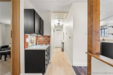 Welcome to this spacious yet cozy, 3 Bedroom, 2 Bath, end unit on Seasons Ridge At Four Seasons in Missouri - for sale on GolfHomes.com, golf home, golf lot