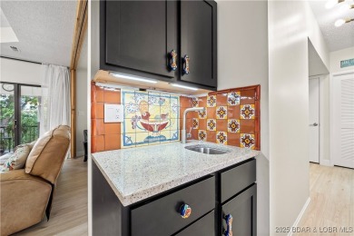 Welcome to this spacious yet cozy, 3 Bedroom, 2 Bath, end unit on Seasons Ridge At Four Seasons in Missouri - for sale on GolfHomes.com, golf home, golf lot