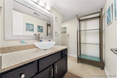 Welcome to this spacious yet cozy, 3 Bedroom, 2 Bath, end unit on Seasons Ridge At Four Seasons in Missouri - for sale on GolfHomes.com, golf home, golf lot