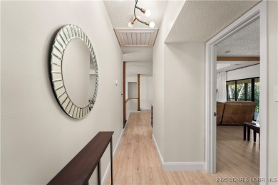 Welcome to this spacious yet cozy, 3 Bedroom, 2 Bath, end unit on Seasons Ridge At Four Seasons in Missouri - for sale on GolfHomes.com, golf home, golf lot